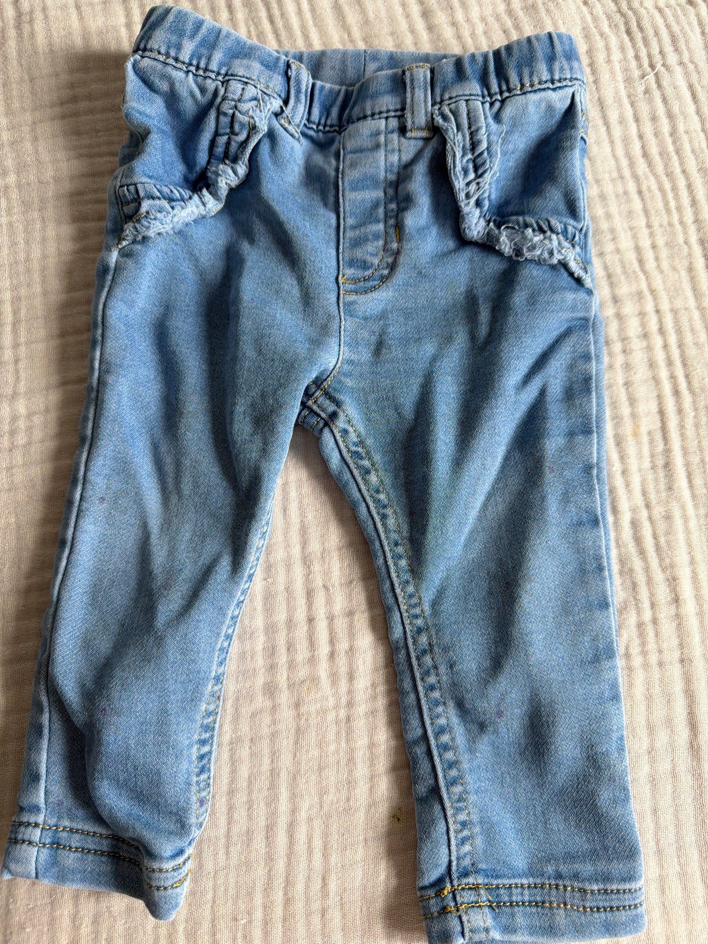 Jeans 6-9 mois avec motif de fleur