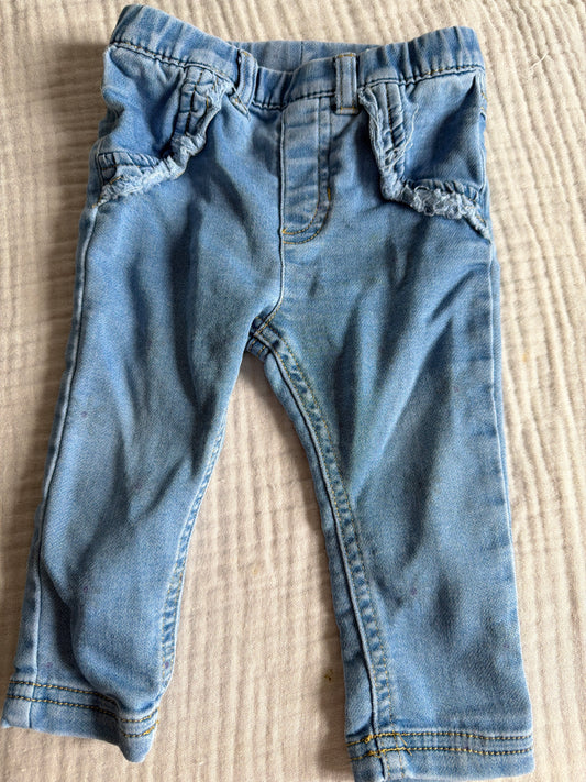 Jeans 6-9 mois avec motif de fleur